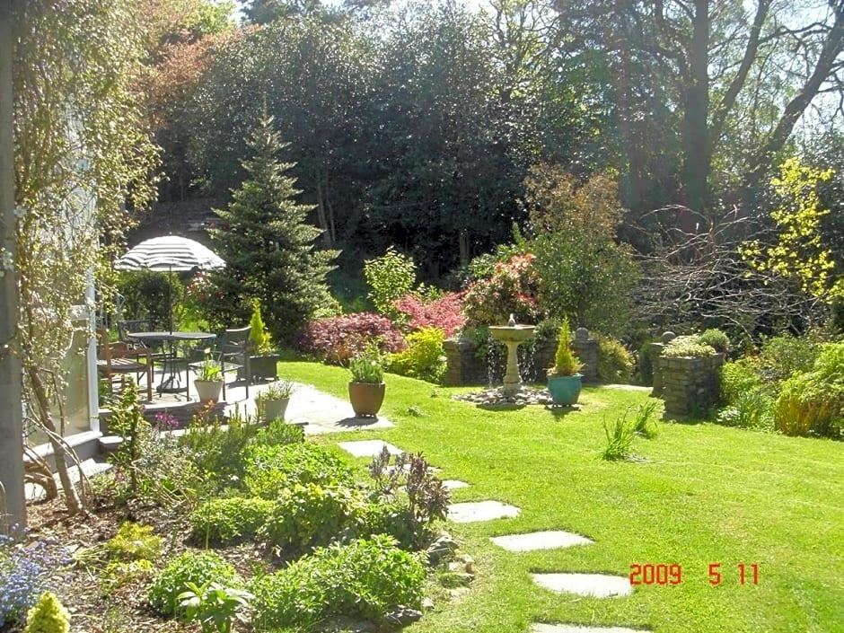 The mature garden with fountain and terrace